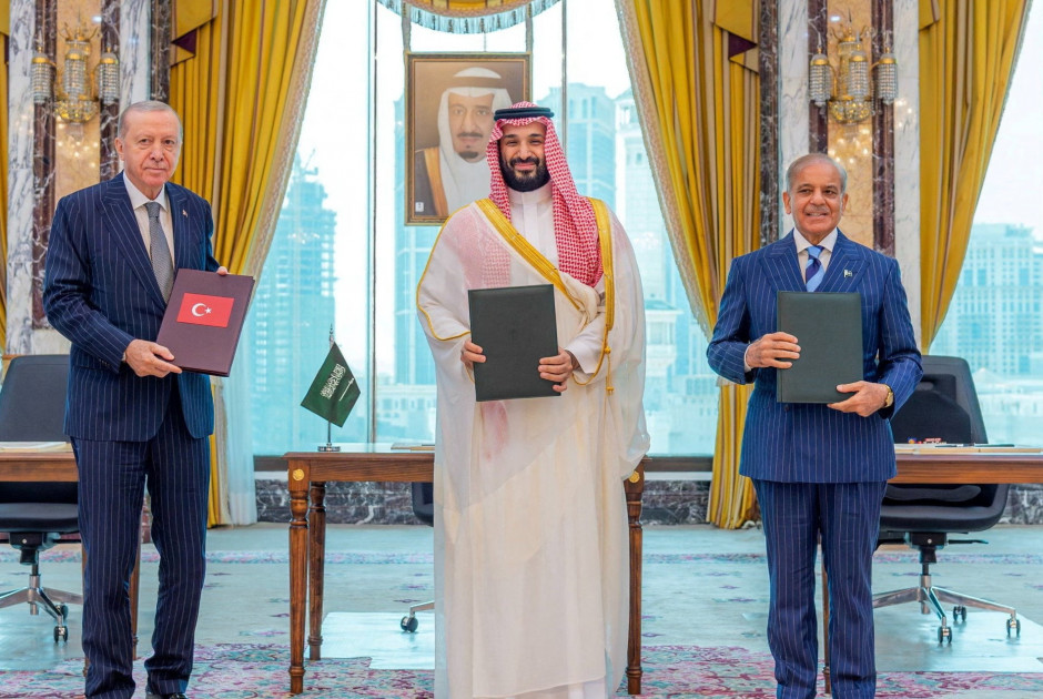 From left: the Turkish president, Recep Tayyip Erdoğan, the Saudi crown prince, Mohammed bin Salman, and Pakistan’s prime minister, Shehbaz Sharif, after signing the joint defence agreement in Mecca on Friday. Photograph: Saudi Press Agency/Reuters
